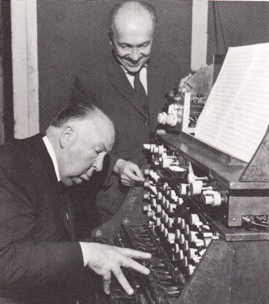 Oskar Salla and Alfred Hitchcock working on the sound effects for the film 'The Birds'
